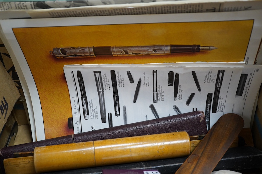 A collection of writing accessories including rulers, scientific rulers, paper knives, a Mauchline ware pencil case, pen nibs, etc. Condition - fair